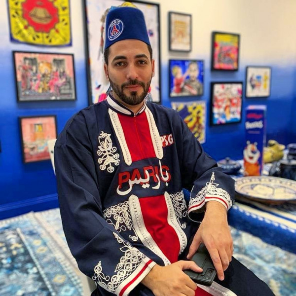 COMBO at his exhibition in London