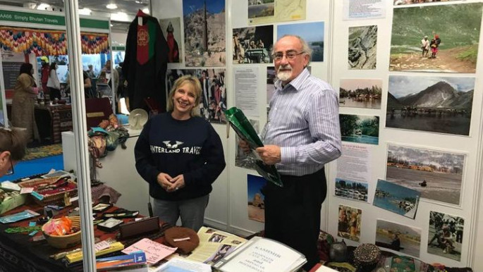 Hann and his partner Tina Townsend-Greaves at a travel show [photo credit: Karen Dabrowska]